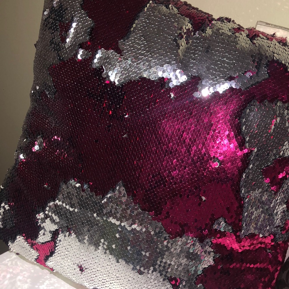 A cute sequins pillow .